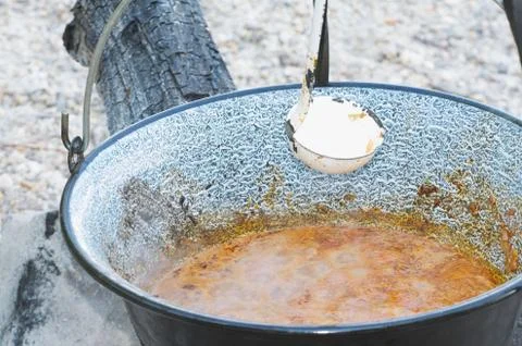 Cauldron with Fish Soup Stock Photos