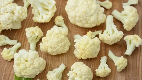 Cauliflower on a board. Stock Footage