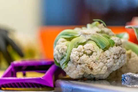 Cauliflower Laying on Kitchen Table Foto stock