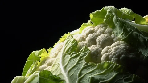 Cauliflower in rotation on black background. Stock Footage 98762353