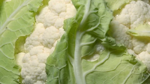 Cauliflower in rotation on black background. Stock Footage 98762591