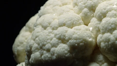 Cauliflower in rotation on black background. Stock Footage 98763090