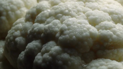 Cauliflower in rotation on black background. Stock Footage 98763466