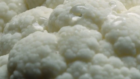 Cauliflower in rotation on black background. Stock Footage 98763553