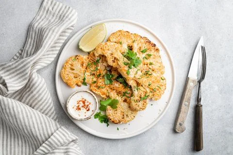 Cauliflower steaks Stock Photos