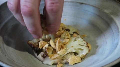 Cauliflower with truffle and almonds Stock Footage 153385885