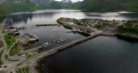 Causeway between Senja and quaint fishing village of Husoy island, Norway Stock Footage 320457893