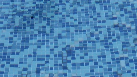 The Caustic of the Bottom of the Pool Ripples and Flows Like Lantern Waves.  Video stock 205019499