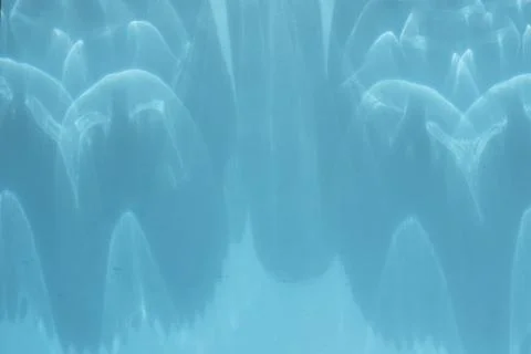 Caustic effect, play of shadows on blue background Stock Photos