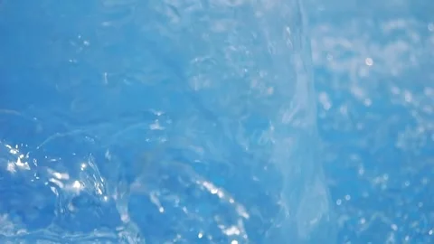 Caustic water with light and ripples on the water surface in slow motion 300f Stock Footage 283828277
