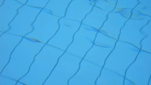 Caustic water with light and ripples on the water surface in slow motion 300fps Video stock 283828294