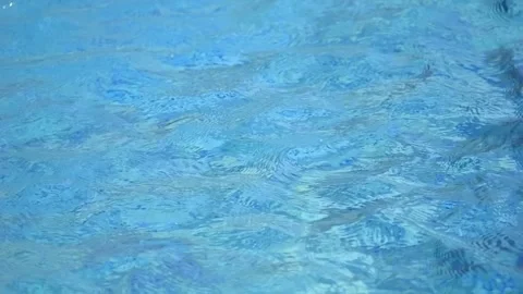 Caustic water with light and ripples on the water surface in slow motion 300f Stock Footage 283828332