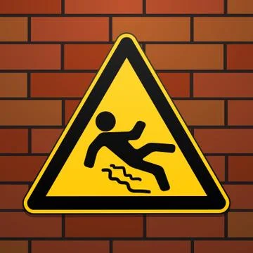 Caution - danger Beware of slippery. Safety sign. The triangular sign on a brick Stock Illustration