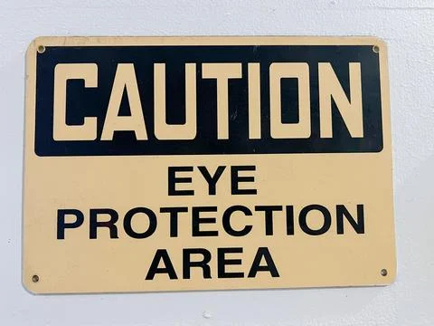 Caution Eye Protection required in this area sign Stock Photos