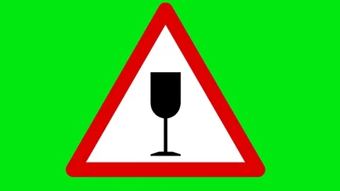 Caution fragile against a green background 库存影片 77352090