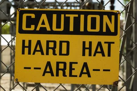 Caution Hard Hat Area Sign Foto stock