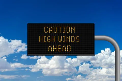 Caution High Winds Ahead variable highway sign 스톡 사진