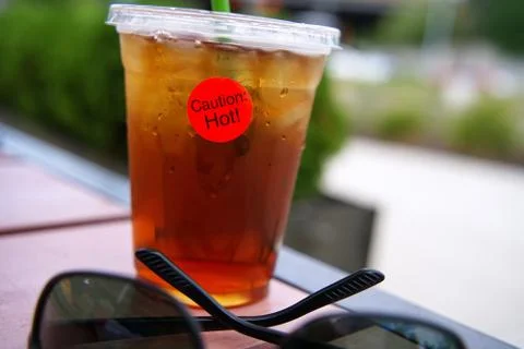 Caution Hot Label on Ice Tea Stock Photos