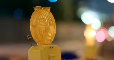 Caution light in the road at night Stock Footage 95820624