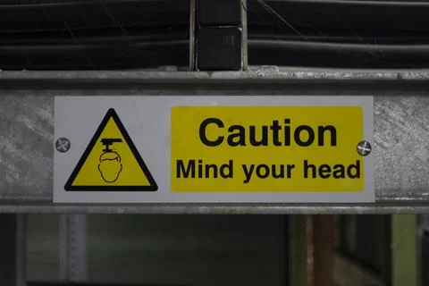 Caution Mind Your Head Sign Stock Photos