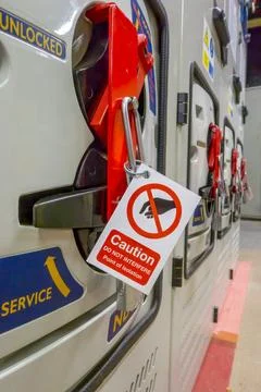 Caution point of isolation label Stock Photos