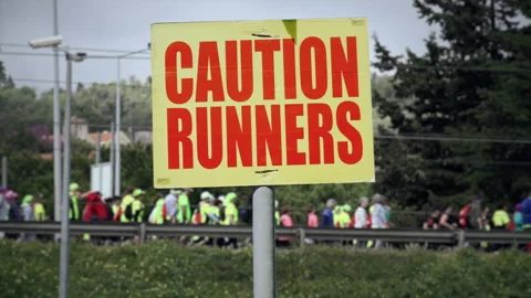 Caution Runners Sign Marathon People Background Stock Footage 238995319
