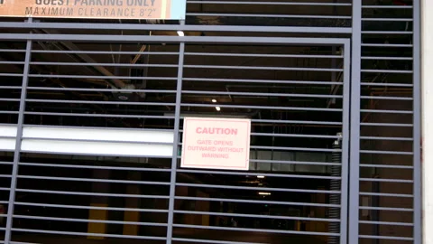 Caution Sign on Parking Garage Gate Stock Footage 237841762