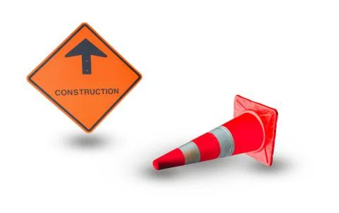 Caution sign on road  Stock Photos