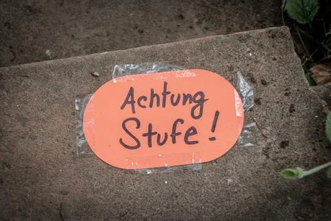 Caution Step taped sticker Stock Photos
