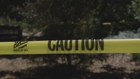 Caution Tape Blowing in the Wind Stock Footage 307446356