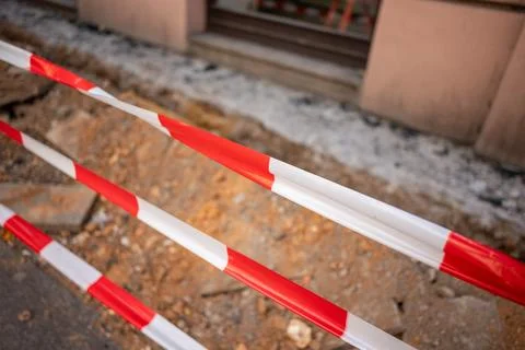 Caution tape at a construction site Stock Photos