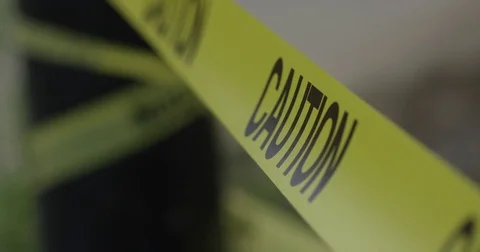 Caution tape -do not cross - slow motion Stock Footage 79278292