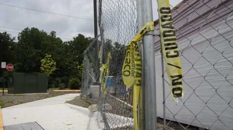 Caution tape on fence 動画素材 54034697