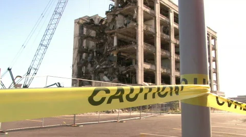 Caution tape in front of building Stockbeeldmateriaal 547678