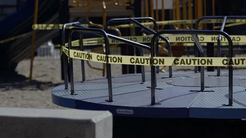 Caution tape on playground Stock Footage 127299309