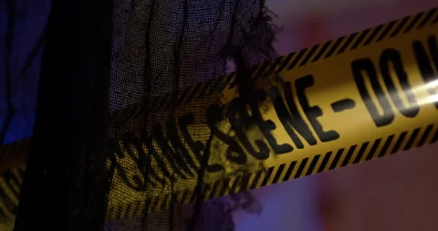 Caution Tape in Slow Motion on Halloween Stock Footage 289568066