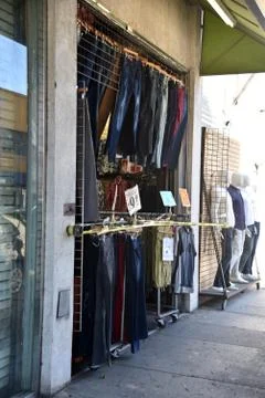 Caution tape on a storefront Stock Photos