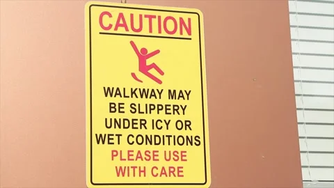 Caution walkway may be slippery under icy or wet conditions please use with care Stock Footage 250278237