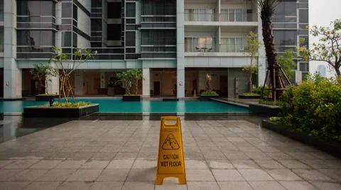 Caution Wet Floor (Time lapse sequence) Stock Footage 46053497