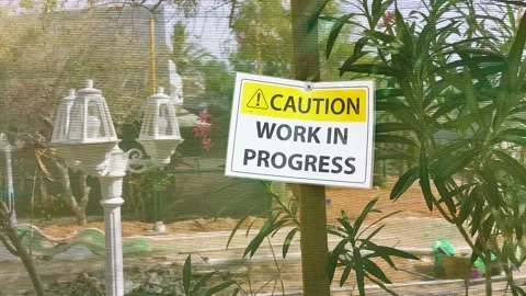Caution, work in progress signs on a fence on a construction area. Concept of Video stock 150870089