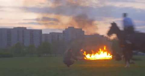Cavalry Horses Jump Over the Burning Barrier. Stock Footage 62794178