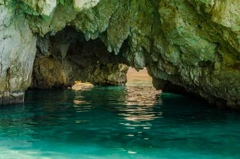 CAVE AND BEACH Stock Photos