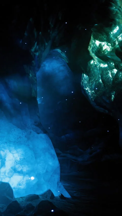 Cave with blue and green lights in dark surroundings Stock Footage 332205823