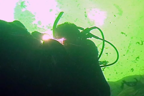 Cave Diver With Flashlight Entering an Underwater Cave Scuba Diving  Stock Footage 142410