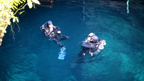Cave diving cenote The Pit, Riviera Maya,  Mexico Stock Footage 90547200