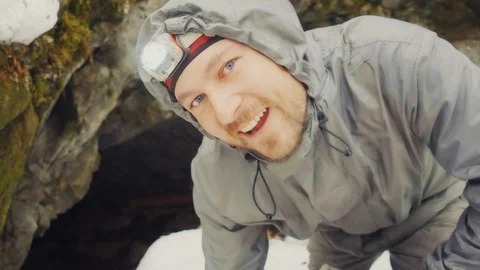 The cave dude crawls out of the cave Stock Footage 114652474