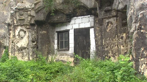 Cave dwellings with limestone blocks facade + pan window Stock Footage 32301742