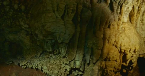 The cave excursion with natural landscape and ancient walls viewed in first Vídeos de archivo 233601040