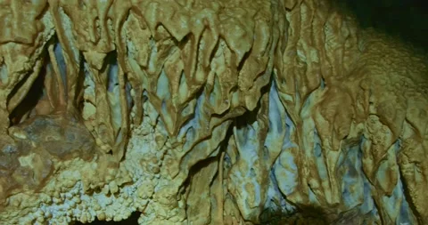 The cave excursion with natural landscape and ancient walls viewed in first Vídeos de archivo 237799883