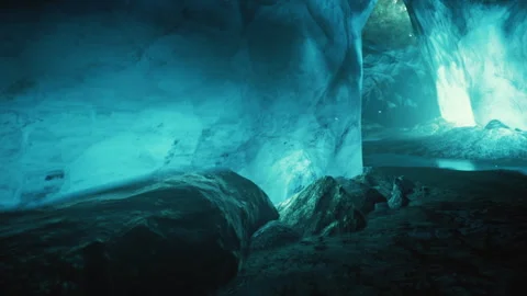 Cave exploration reveals vibrant blue ice in a hidden underground space Stock Footage 344863400
